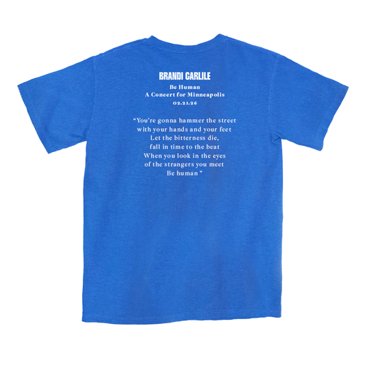 Blue t-shirt with white text on back.